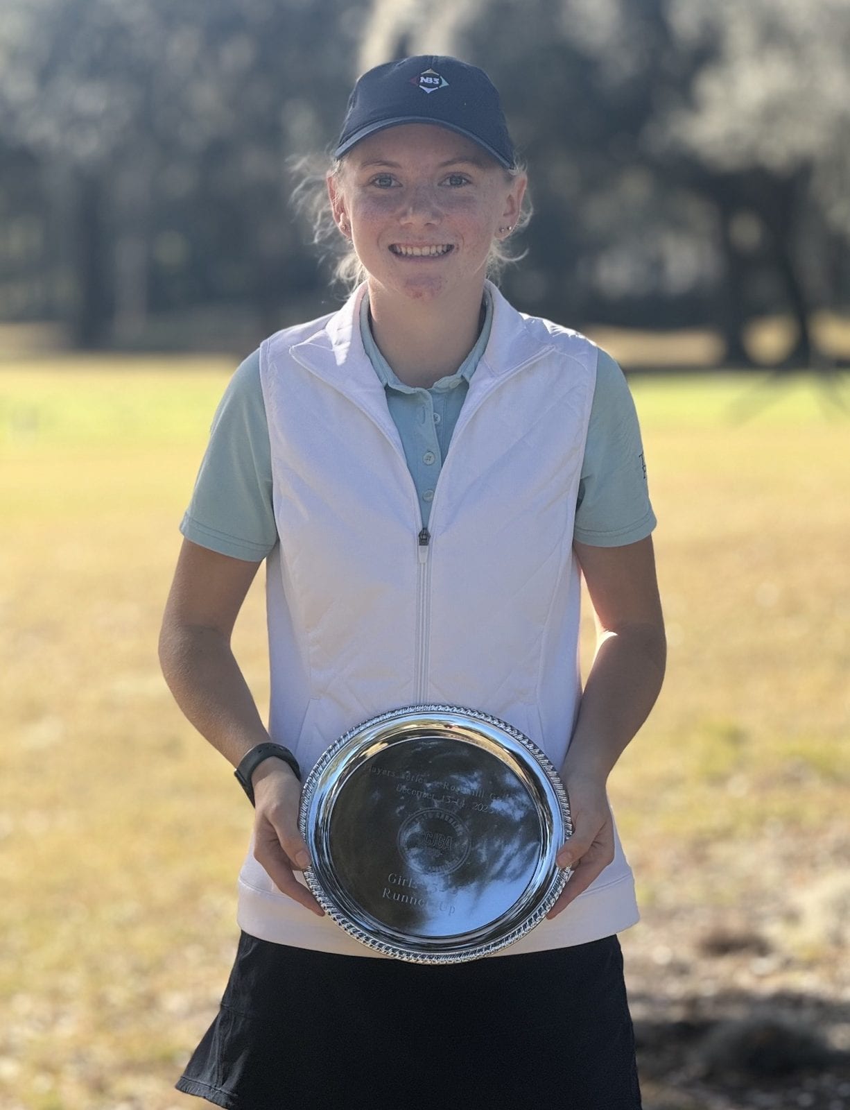 Sofie holding her SCJGA runner-up plate.